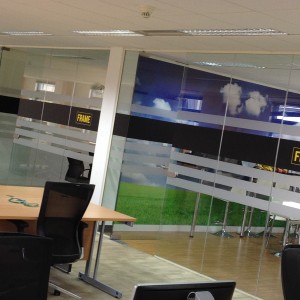 Frame Recruitment Interior Rebrand with Logo on glass partitions