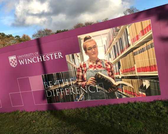 Building site hoarding graphics at University of Winchester